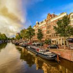Canali di Amsterdam al tramonto